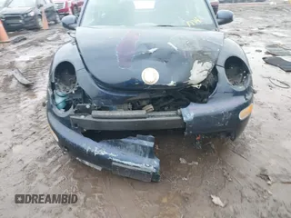 2003 Volkswagen New Beetle Coupe GL with VIN 3VWBK21C03M437759, listed as a IAAI auction lot 41573282 with 73,493 mi miles. Bid and sale history available at carsss.com. Image 6.