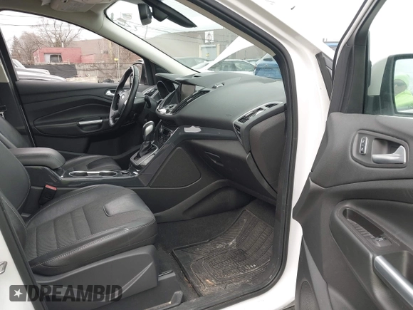 2013 Ford Escape Titanium with VIN 1FMCU0J96DUD85315, listed as a IAAI auction lot 41934204 with 152,132 mi miles and . Bid and sale history available at carsss.com. Image 5.