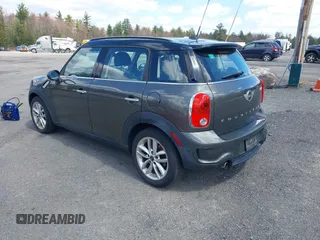 2014 MINI Countryman S with VIN WMWZC3C58EWP27041, listed as a IAAI auction lot 42082489 with 77,749 mi miles and . Bid and sale history available at DreamBid. Image 3.