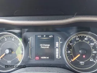2015 Jeep Cherokee Latitude with VIN 1C4PJMCB1FW709560, listed as a IAAI auction lot 42035619 with 162,354 mi miles. Bid and sale history available at carsss.com. Image 7.