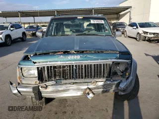 1995 Jeep Cherokee Country with VIN 1J4FJ78S5SL636284, listed as a Copart auction lot 76145234 with 104,048 mi miles and Salvage Title. Bid and sale history available at carsss.com. Image 5.