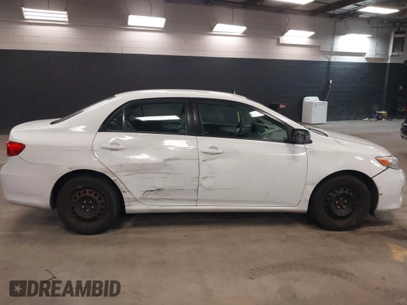 2012 Toyota Corolla L with VIN 2T1BU4EE2CC855849, listed as a IAAI auction lot 42040963 with 156,639 mi miles. Bid and sale history available at carsss.com. Image 13.