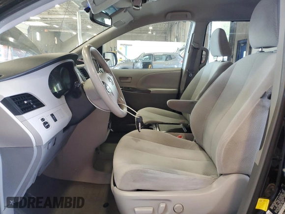 2013 Toyota Sienna LE AAS with VIN 5TDKK3DC7DS280463, listed as a Copart auction lot 61393215 with 195,785 mi miles and Salvage title. Bid and sale history available at DreamBid. Image 7.