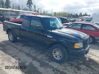2009 Ford Ranger XLT with VIN 1FTYR44E49PA27292, listed as a IAAI auction lot 42014607 with 120,695 mi miles. Bid and sale history available at carsss.com. Image 1.