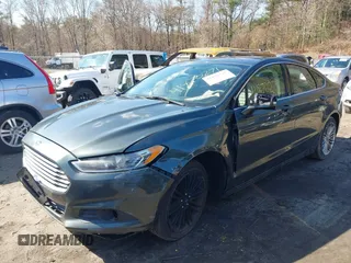 2015 Ford Fusion SE with VIN 3FA6P0H92FR100897, listed as a IAAI auction lot 41870271 with 195,182 mi miles and . Bid and sale history available at DreamBid. Image 2.