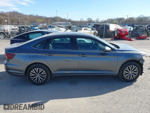 2021 Volkswagen Jetta S z VIN 3VWC57BU8MM098931, wystawiony jako IAAI lot #41818622 z przebiegiem 10 469 mil mil oraz . Historia ofert i sprzedaży dostępna na DreamBid. Obrazek 14.