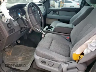 2012 Ford F-150 XL with VIN 1FTFW1ETXCFB32623, listed as a Copart auction lot 54597435 with 210,722 mi miles and Salvage Title. Bid and sale history available at DreamBid. Image 7.