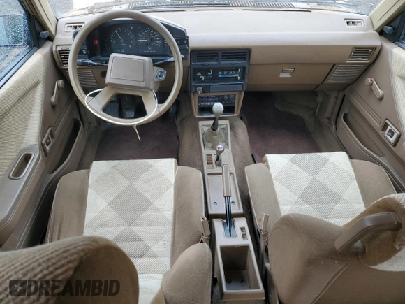 1985 Toyota Tercel z VIN JT2AL35W3F0174785, wystawiony jako Copart lot #50786875 z przebiegiem 499 739 mil mil oraz Szkoda całkowita • Salvage title. Historia ofert i sprzedaży dostępna na DreamBid. Obrazek 8.