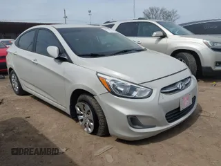2015 Hyundai Accent GLS with VIN KMHCT4AE8FU921871, listed as a IAAI auction lot 42016003 with 97,568 mi miles. Bid and sale history available at carsss.com. Image 1.