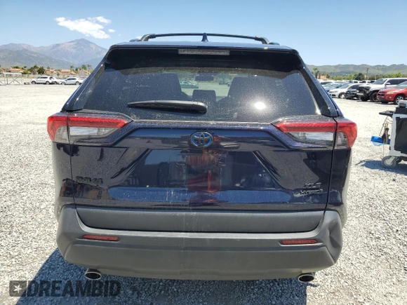 2022 Toyota RAV4 Hybrid XLE Premium z VIN 4T3B6RFV5NU097584, wystawiony jako Copart lot #56163835 z przebiegiem 25 016 mil mil oraz Szkoda całkowita • Salvage title. Historia ofert i sprzedaży dostępna na DreamBid. Obrazek 6.
