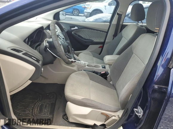 2012 Ford Focus SE z VIN 1FAHP3K22CL126478, wystawiony jako Copart lot #60053565 z przebiegiem 130 887 mil mil oraz Czysty tytuł • Clean title. Historia ofert i sprzedaży dostępna na DreamBid. Obrazek 7.