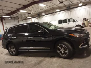 2019 Infiniti QX60 Luxe with VIN 5N1DL0MMXKC565309, listed as a IAAI auction lot 42184987 with 129,985 mi miles and . Bid and sale history available at DreamBid. Image 14.