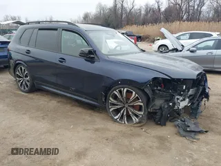 2023 BMW X7 M60i z VIN 5UX33EM04P9P11491, wystawiony jako IAAI lot #41806156 z przebiegiem Nie podano mil oraz . Historia ofert i sprzedaży dostępna na DreamBid. Obrazek 1.