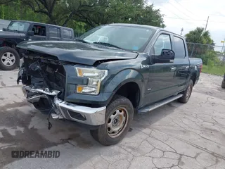 2015 Ford F-150 XLT with VIN 1FTEW1EG5FFA99713, listed as a IAAI auction lot 42481854 with 165,415 mi miles and . Bid and sale history available at DreamBid. Image 2.