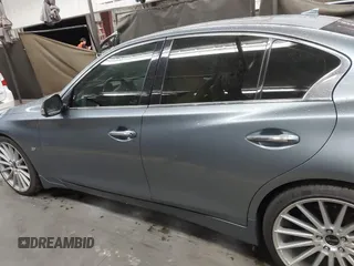 2015 Infiniti Q50 Premium z VIN JN1BV7AP6FM337369, wystawiony jako IAAI lot #41788419 z przebiegiem 106 977 mil mil oraz . Historia ofert i sprzedaży dostępna na DreamBid. Obrazek 14.