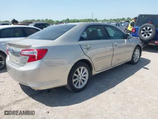 2013 Toyota Camry Hybrid LE with VIN 4T1BD1FK3DU092856, listed as a IAAI auction lot 42010493 with 27,497 mi miles. Bid and sale history available at carsss.com. Image 4.