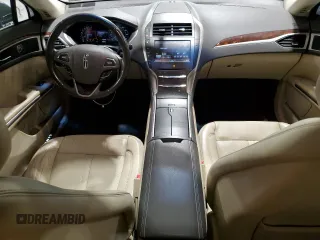 2015 Lincoln MKZ z VIN 3LN6L2J95FR613519, wystawiony jako Copart lot #59165895 z przebiegiem 117 630 mil mil oraz Szkoda całkowita • Salvage title. Historia ofert i sprzedaży dostępna na DreamBid. Obrazek 8.
