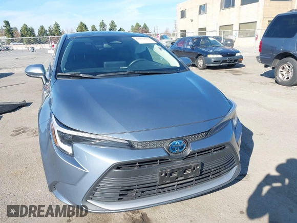 2023 Toyota Corolla Hybrid LE with VIN JTDBCMFEXP3006343, listed as a IAAI auction lot 41056503 with 121,690 mi miles. Bid and sale history available at carsss.com. Image 12.