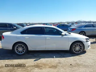 2014 Volkswagen Passat TDI SE w/Sunroof with VIN 1VWBN7A32EC016554, listed as a IAAI auction lot 41472156 with 178,149 mi miles. Bid and sale history available at carsss.com. Image 13.