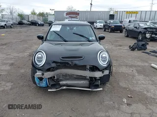 2020 MINI Hardtop Cooper S z VIN WMWXR5C00L2L44737, wystawiony jako IAAI lot #42091511 z przebiegiem 24 356 mil mil oraz . Historia ofert i sprzedaży dostępna na DreamBid. Obrazek 6.