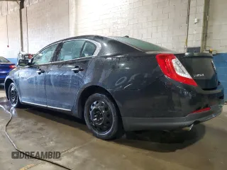 2014 Lincoln MKS z VIN 1LNHL9DK7EG610823, wystawiony jako Copart lot #47544585 z przebiegiem 131 176 mil mil oraz Czysty tytuł • Clean title. Historia ofert i sprzedaży dostępna na DreamBid. Obrazek 2.