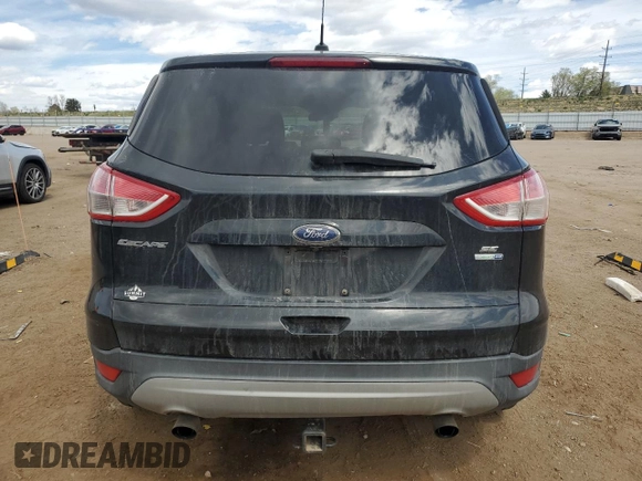 2015 Ford Escape SE with VIN 1FMCU9G96FUC65061, listed as a Copart auction lot 53571625 with 129,048 mi miles and Salvage Title. Bid and sale history available at carsss.com. Image 6.