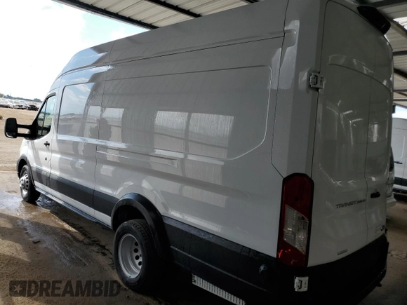 2022 Ford Transit Cargo z VIN 1FTRU8XG3NKA70813, wystawiony jako Copart lot #67283004 z przebiegiem 81 mil mil oraz Czysty tytuł • Clean title. Historia ofert i sprzedaży dostępna na DreamBid. Obrazek 2.