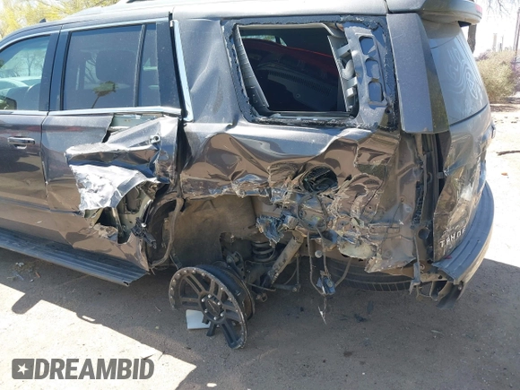 2017 Chevrolet Tahoe LS with VIN 1GNSCAKC3HR328833, listed as a IAAI auction lot 41993364 with 124,817 mi miles and . Bid and sale history available at DreamBid. Image 6.
