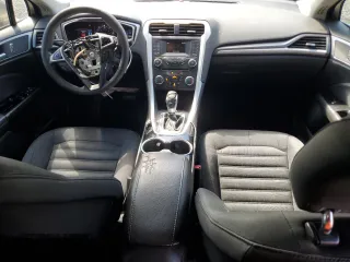 2015 Ford Fusion SE Hybrid z VIN 3FA6P0LU7FR102723, wystawiony jako Copart lot #62334345 z przebiegiem 136 341 mil mil oraz Nie do naprawy • Non repairable. Historia ofert i sprzedaży dostępna na DreamBid. Obrazek 8.