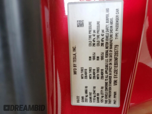 2022 Tesla Model 3 Long Range with VIN 5YJ3E1EBXNF285779, listed as a Copart auction lot 54630135 with 129,097 mi miles and Clean Title. Bid and sale history available at DreamBid. Image 13.