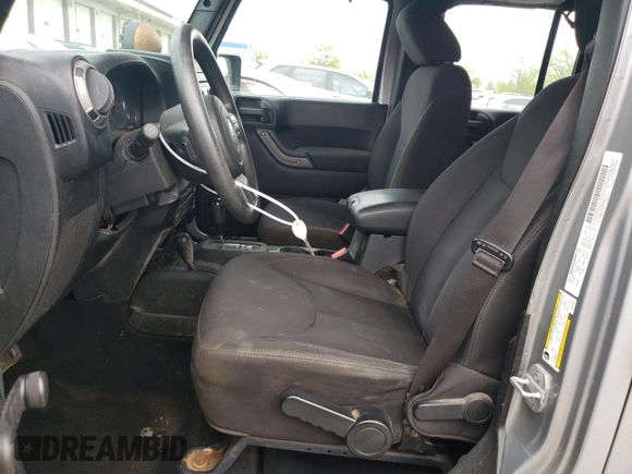2013 Jeep Wrangler Unlimited Sport z VIN 1C4BJWDG2DL685896, wystawiony jako Copart lot #53951415 z przebiegiem 142 516 mil mil oraz Tytuł czysty. Historia ofert i sprzedaży dostępna na DreamBid. Obrazek 7.