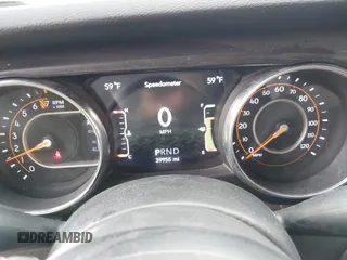 2021 Jeep Wrangler Unlimited Sport S with VIN 1C4HJXDG8MW509322, listed as a IAAI auction lot 42110123 with 39,955 mi miles and . Bid and sale history available at DreamBid. Image 7.