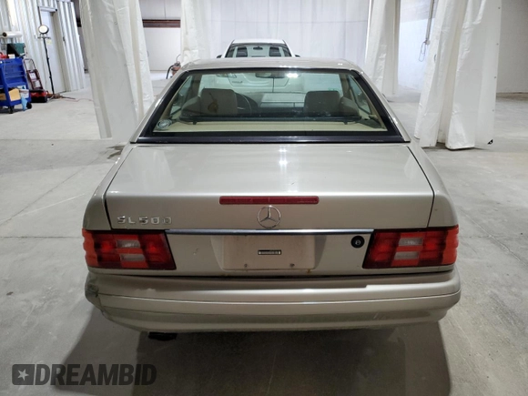 1999 Mercedes-Benz SL-Class with VIN WDBFA68F9XF172312, listed as a Copart auction lot 61248884 with 104,331 mi miles and Salvage Title. Bid and sale history available at carsss.com. Image 6.
