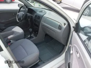 2002 Kia Rio with VIN KNADC123926185376, listed as a IAAI auction lot 42027348 with 84,893 mi miles. Bid and sale history available at carsss.com. Image 5.