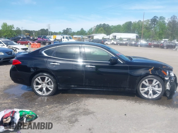 2013 Infiniti M with VIN JN1AY1AR6DM590187, listed as a IAAI auction lot 42096806 with 182,909 mi miles and . Bid and sale history available at DreamBid. Image 13.