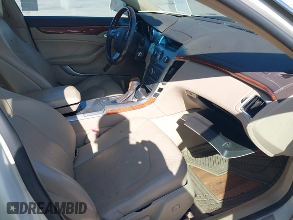 2008 Cadillac CTS RWD z VIN 1G6DV57V280142396, wystawiony jako IAAI lot #42086055 z przebiegiem 183 113 mil mil oraz . Historia ofert i sprzedaży dostępna na DreamBid. Obrazek 5.