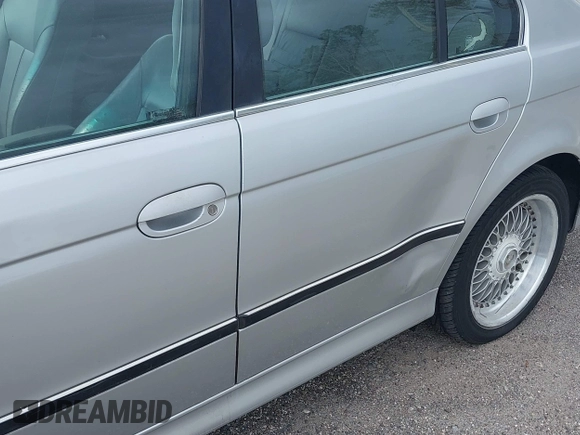 2000 BMW 5 Series 528iA with VIN WBADM6344YGU22084, listed as a IAAI auction lot 41734099 with 249,650 mi miles. Bid and sale history available at carsss.com. Image 6.