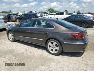 2013 Volkswagen CC R-Line with VIN WVWBP7AN8DE570229, listed as a Copart auction lot 58868614 with 92,166 mi miles and Salvage Title. Bid and sale history available at carsss.com. Image 2.