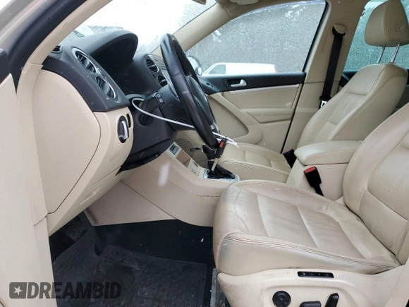2012 Volkswagen Tiguan S with VIN WVGBV7AX4CW581692, listed as a Copart auction lot 86061624 with 168,362 mi miles and Clean Title. Bid and sale history available at DreamBid. Image 7.