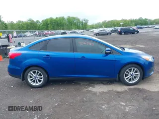 2018 Ford Focus SE z VIN 1FADP3F29JL235302, wystawiony jako IAAI lot #42262964 z przebiegiem 85 127 mil mil oraz . Historia ofert i sprzedaży dostępna na DreamBid. Obrazek 13.