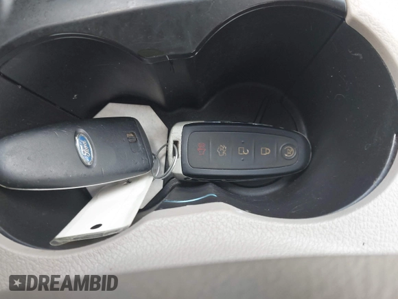 2014 Ford Focus Electric with VIN 1FADP3R49EL355751, listed as a IAAI auction lot 42628237 with 56,551 mi miles and . Bid and sale history available at DreamBid. Image 11.