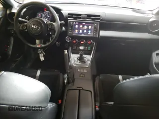 2023 Toyota GR86 Premium with VIN JF1ZNBE10P9761127, listed as a Copart auction lot 42639055 with 28,013 mi miles and Salvage Title. Bid and sale history available at carsss.com. Image 8.