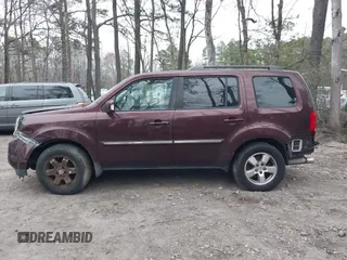 2010 Honda Pilot Touring with VIN 5FNYF4H9XAB040715, listed as a IAAI auction lot 41807334 with 262,786 mi miles and . Bid and sale history available at carsss.com. Image 15.