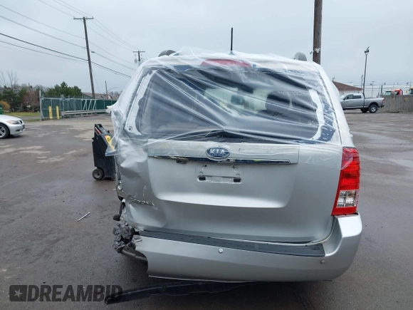 2012 Kia Sedona LX with VIN KNDMG4C72C6485952, listed as a IAAI auction lot 42029147 with 129,296 mi miles. Bid and sale history available at carsss.com. Image 16.