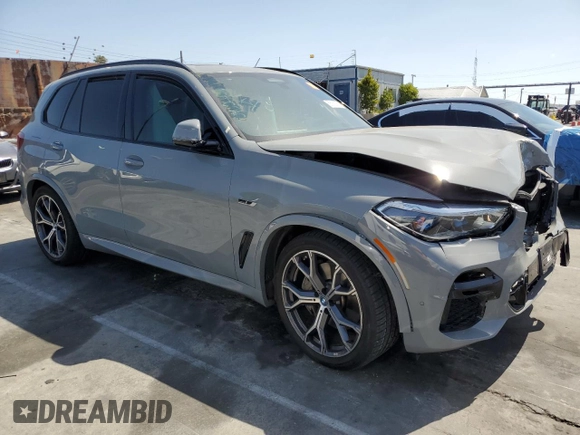 2023 BMW X5 xDrive45e with VIN 5UXTA6C0XP9P49482, listed as a Copart auction lot 56730735 with Not provided miles and Salvage title. Bid and sale history available at DreamBid. Image 4.