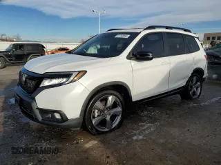 2021 Honda Passport Touring with VIN 5FNYF8H96MB005648, listed as a Copart auction lot 87242864 with 40,770 mi miles and Salvage Title. Bid and sale history available at carsss.com. Image 1.