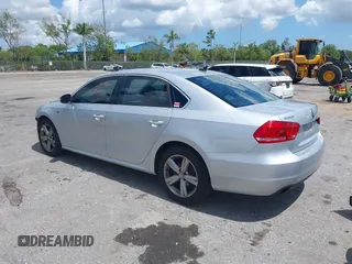 2015 Volkswagen Passat 1.8T Limited Edition with VIN 1VWAT7A35FC109653, listed as a IAAI auction lot 41917568 with 118,912 mi miles. Bid and sale history available at carsss.com. Image 3.