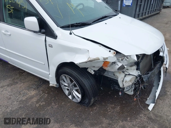 2014 Dodge Grand Caravan SXT with VIN 2C4RDGCG6ER361842, listed as a IAAI auction lot 41827951 with 100,845 mi miles and . Bid and sale history available at DreamBid. Image 6.