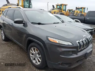 2015 Jeep Cherokee Latitude with VIN 1C4PJLCB6FW547788, listed as a IAAI auction lot 42177621 with 138,945 mi miles and . Bid and sale history available at carsss.com. Image 1.