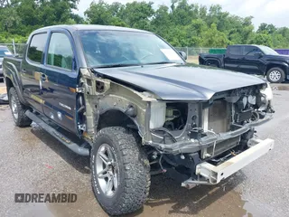 2013 Toyota Tacoma PreRunner with VIN 3TMJU4GN8DM153858, listed as a IAAI auction lot 42721831 with 89,548 mi miles and . Bid and sale history available at DreamBid. Image 1.